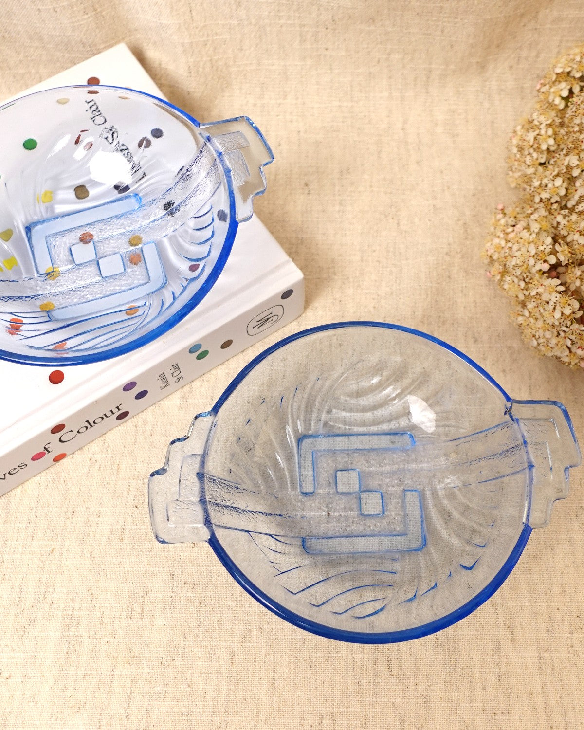A pair of art deco blue glass bowls